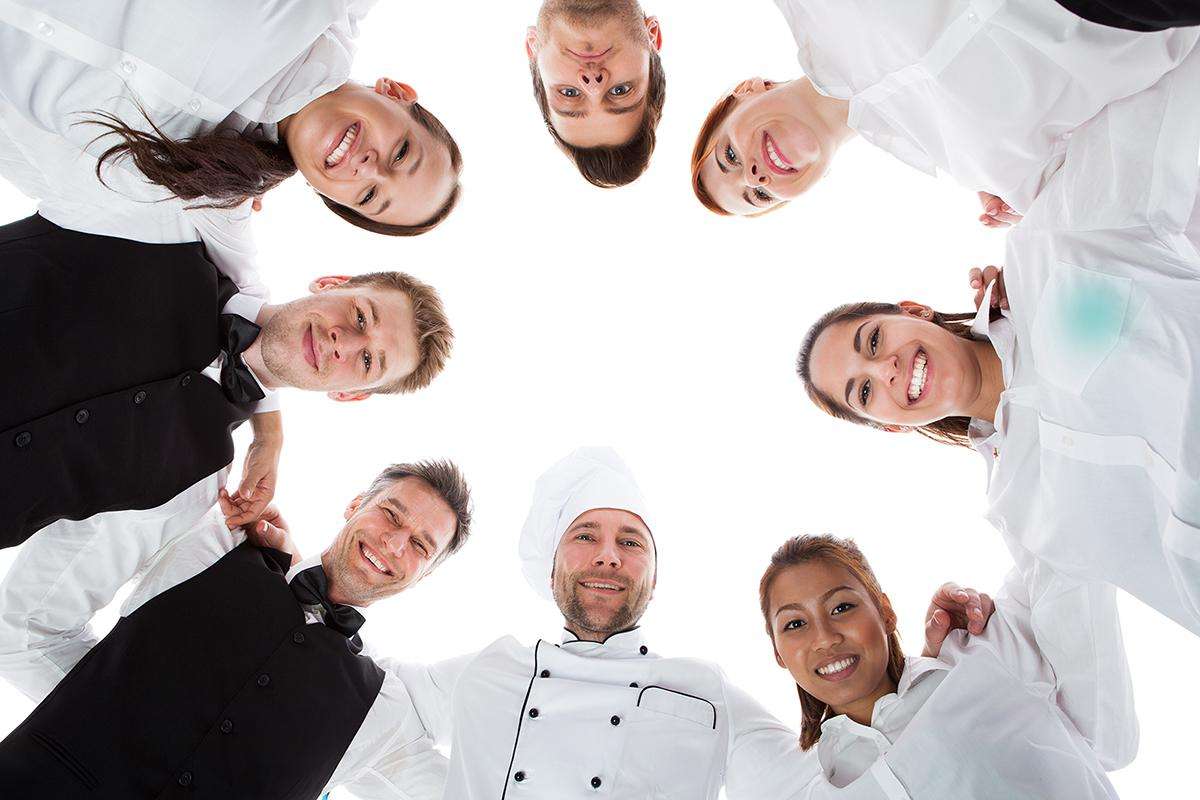 Waiters And Waitresses Standing In Circle